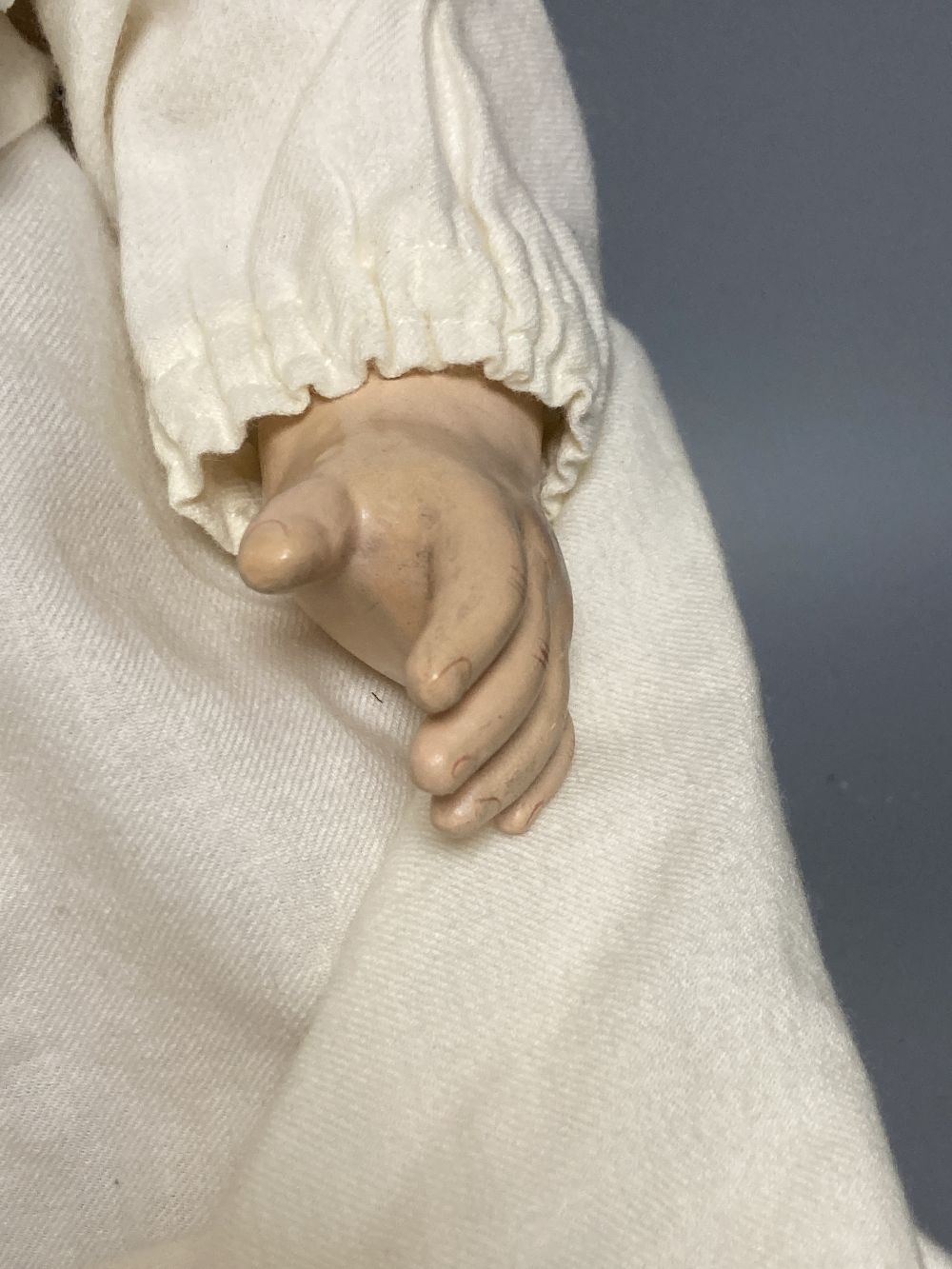 A French SFBJ bisque-headed doll, mould 236 with sleeping eyes and closed mouth, bent-limb composition body, 48cm
